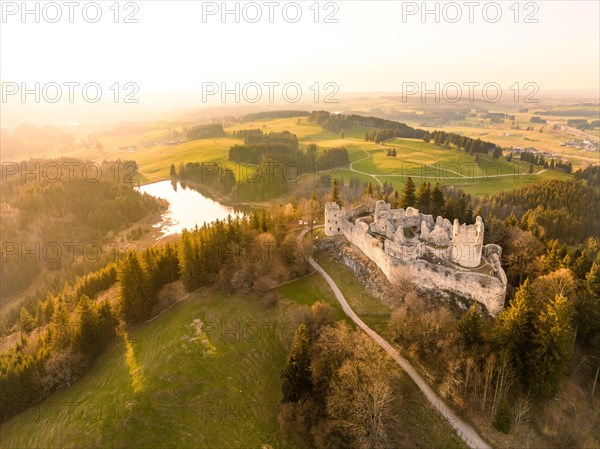 Eisenberg castle ruins in winter at sunset