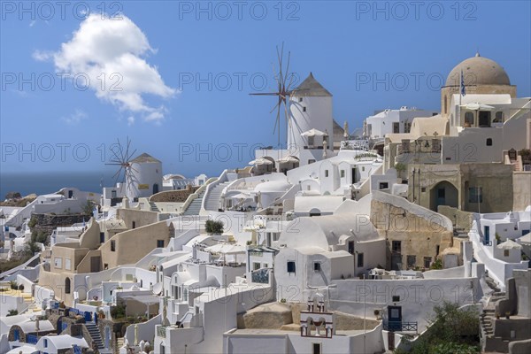 View over the town of Oia situated on the crater rim