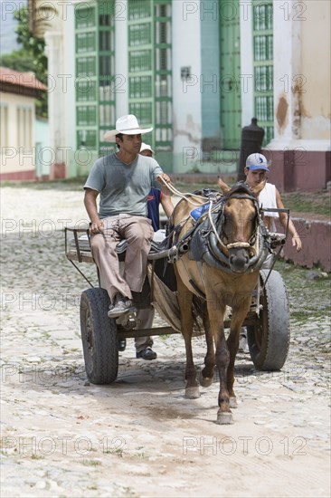 Old colorful horse and donkey carts in the streets of Havana