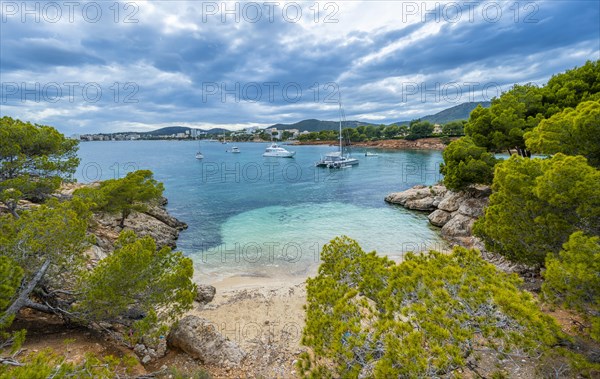 Small bay with sandy beach and blue sea