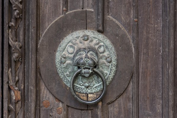 Door knocker with lions head on a door of the Lorenzkirche