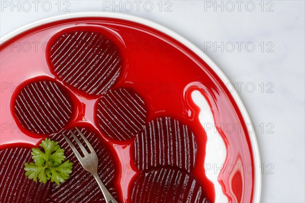 Sliced pickled beetroot on plate