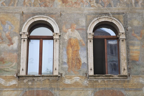 House facades with frescoes on the market square of Trento