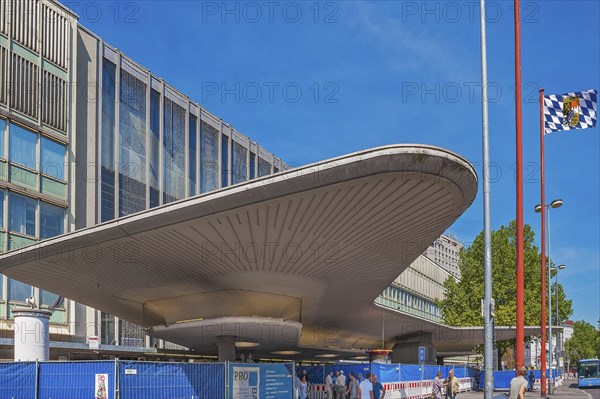 Central station entrance with curved canopy