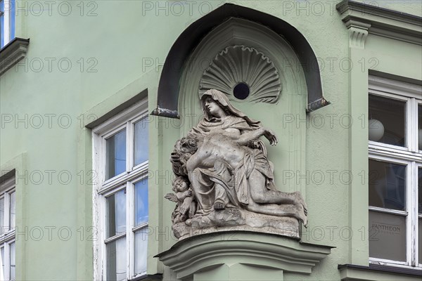 Sculpture of the Pieta on a corner house