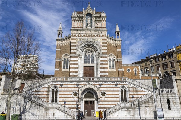 Building of the Capuchin Church of Our Lady of Lourdes with a statue of Our Lady of Lourdes and decorated with mosaics