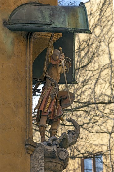 Sculpture of St. Michael the Archangel fighting the devil