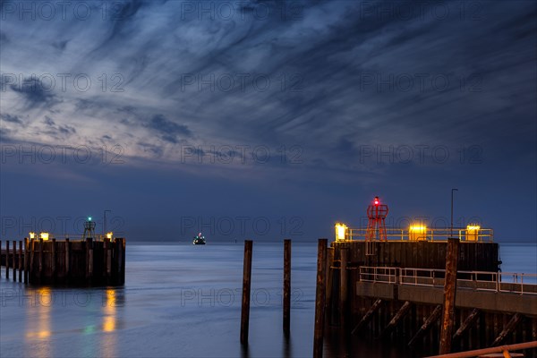 Harbour entrance in Cuxhaven at the mouth of the Elbe at night