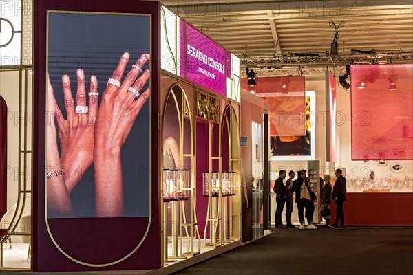 Video wall with precious rings on womans hands