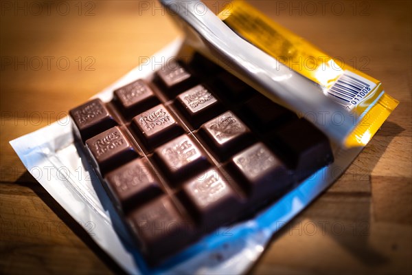 Ritter Sport chocolate lies unwrapped in a package on a kitchen worktop in Berlin