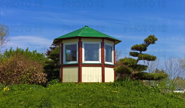 Small wooden arbour on the camping site of Fedderwardersiel