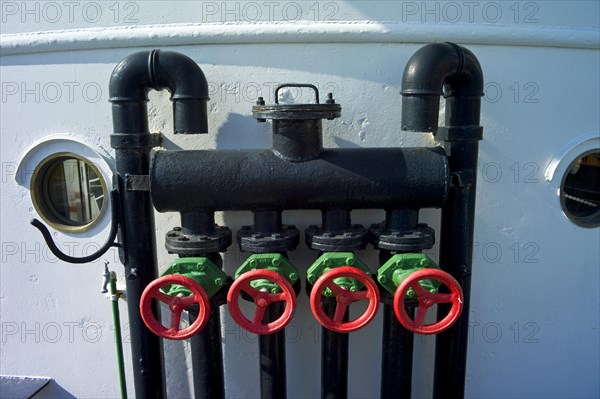 Valves and handwheels on board a ship