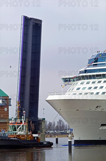 The Celebrity Eclipse passing the Jann Berghaus Bridge in Leer