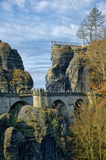 View from the rock castle Neurathen to the Bastei bridge and the new Bastei view