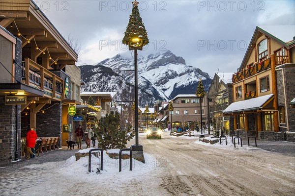 Winter street with Christmas decorations in Banff