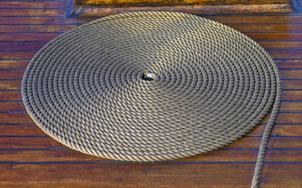 Rolled-up rope on board a sailing vessel