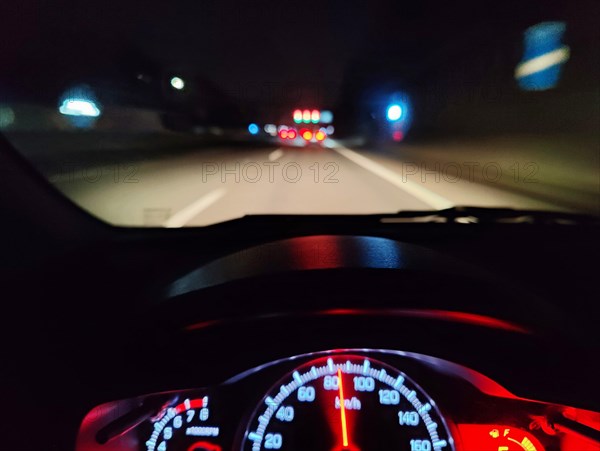 Blurred view from the car on the motorway at night