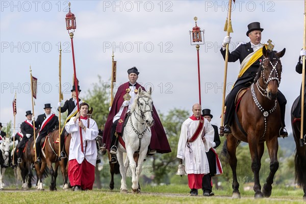 Traditional blood ride with 2200 riders and horses in honour of a blood relic