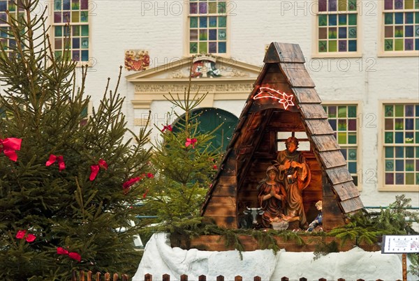 Christmas decoration in front of the moated castle of Dornum