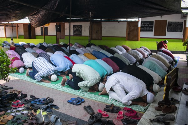 Indian Muslims perform the second Friday prayer in the holy month of Ramadan at a Mosque in Guwahati