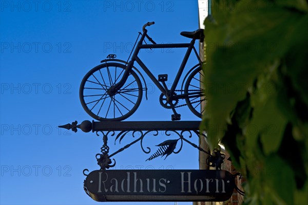 Outdoor advertising of a bicycle repair shop