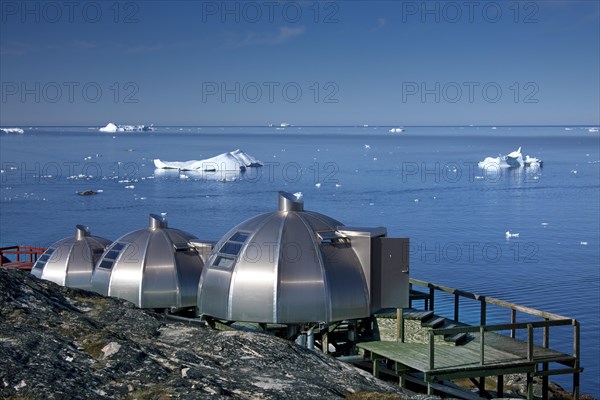 Metal igloo cabins of Hotel Arctic looking over the Ice Fjord at Ilulissat