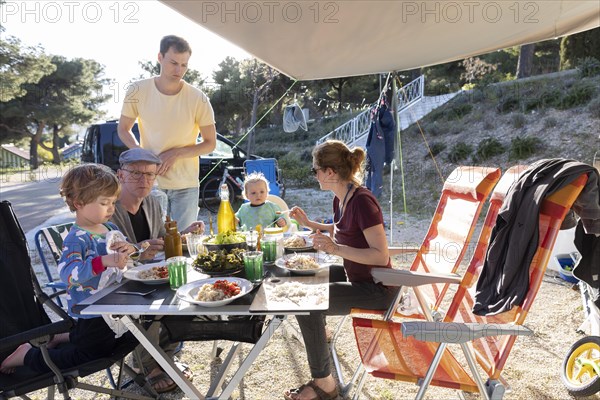 Subject: Family with grandfather camping