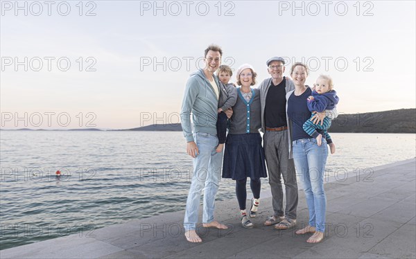 Large family by the sea