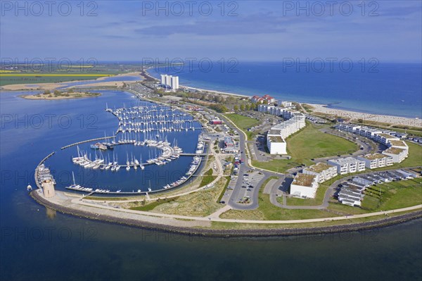 Aerial view over sailing boats docked in the Burgtiefe marina at on Fehmarn