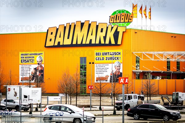 The sign of a Globus DIY store in a commercial area in Berlin