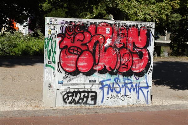 Graffitied colourful electricity distribution board