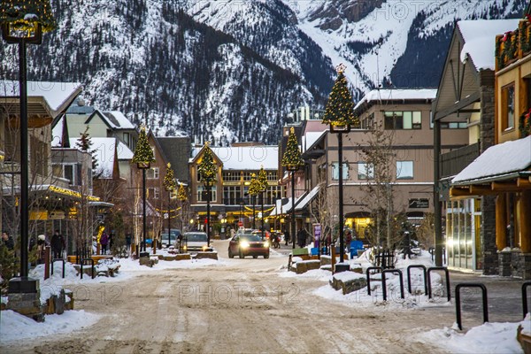 Winter street with Christmas decorations in Banff