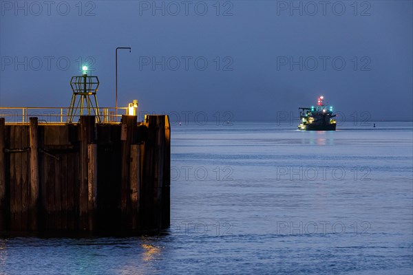 Harbour entrance in Cuxhaven at the mouth of the Elbe at night