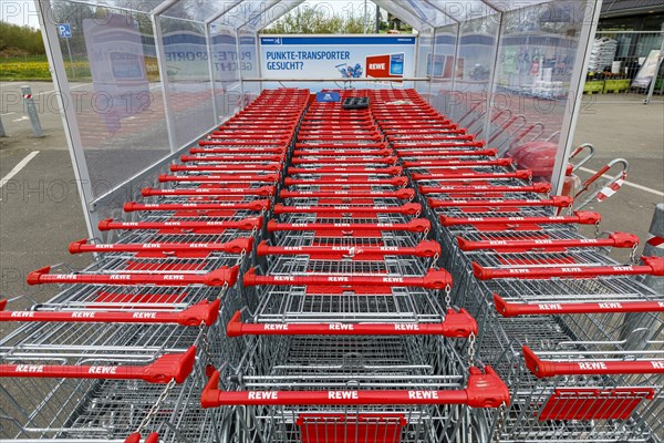 Shopping trolley in a REWE car park