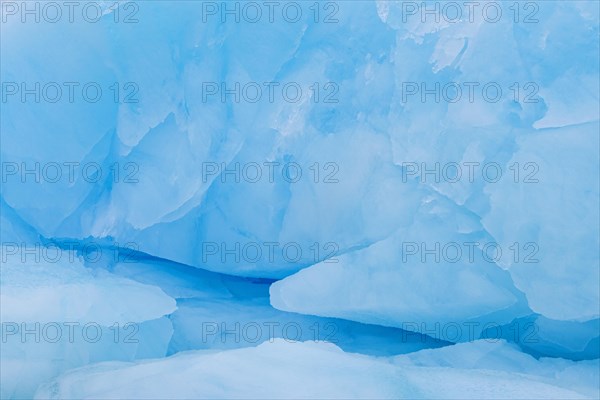 Blue ice abstract close-up of the Negribreen glacier at Spitsbergen