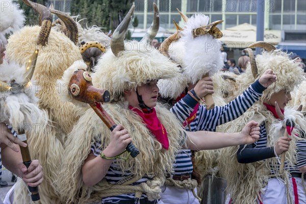 Traditional bell ringer masks in sailors mother