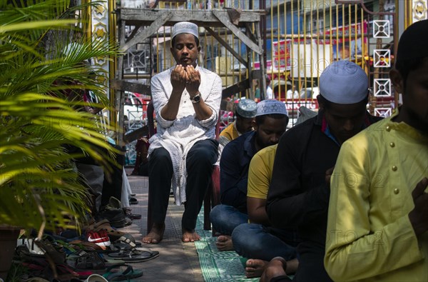 Indian Muslims perform the second Friday prayer in the holy month of Ramadan at a Mosque in Guwahati