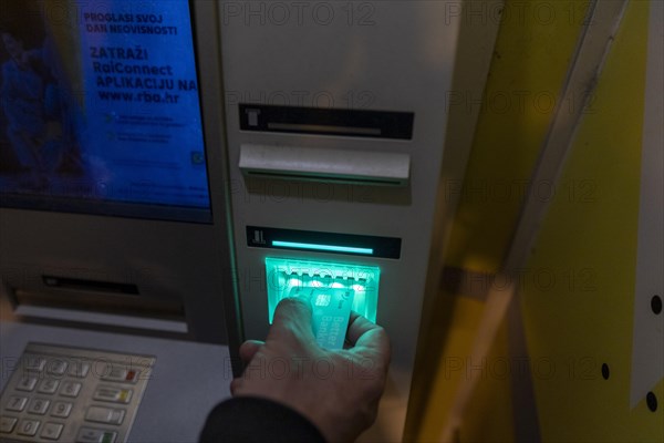 Man at ATM in Zagreb