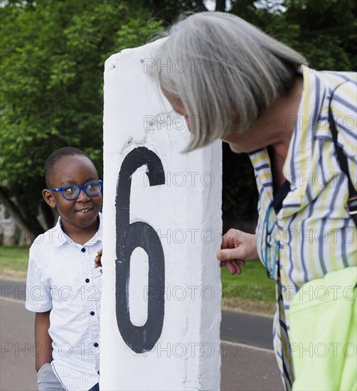 Temporary grandmother. Temporary grandmother cares for a boy from Africa for a few hours a week on a voluntary basis.