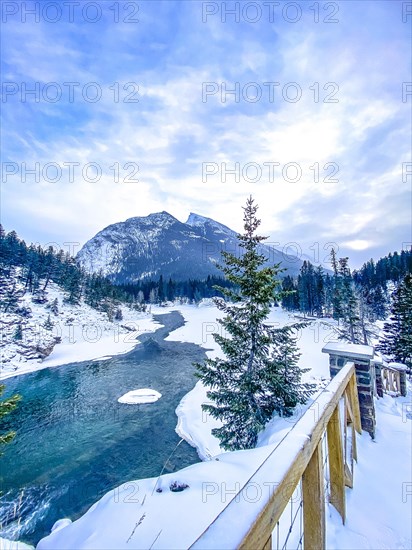 View from Bow Falls Viewpoint along the Bow River to Mt. Rundle