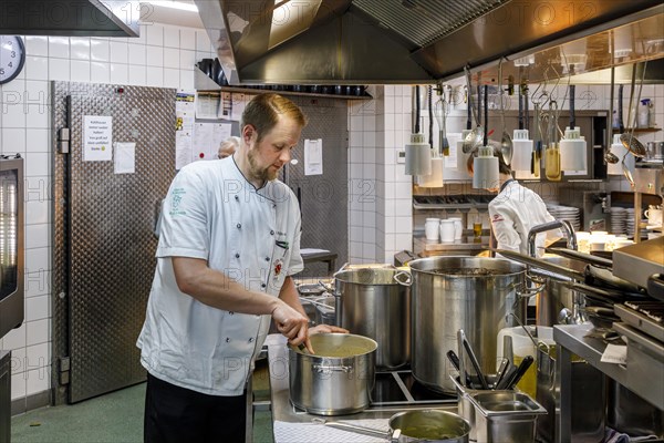 Chef during the preparation of dishes