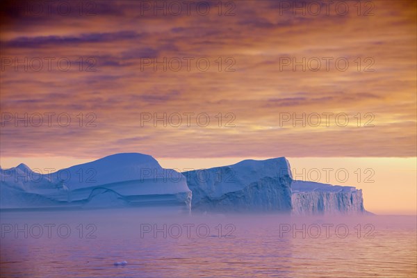 Icebergs at sunset in the Kangia icefjord