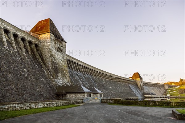 Moehnetalsperre dam with wall towers and below the sluice houses at the Ausgleichsweiher