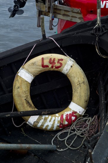 Lifebelt in an open rowing boat