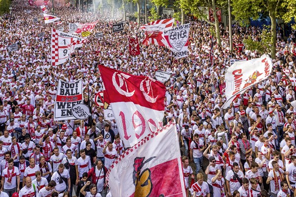 Fans of VfB Stuttgart on their way to the stadium