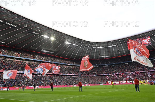 Flag wavers in front of the start of the match