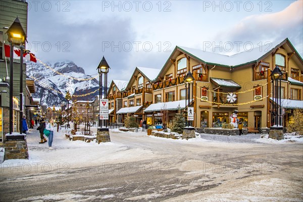 Winter street with Christmas decorations in Banff