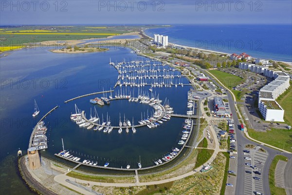 Aerial view over sailing boats docked in the Burgtiefe marina at on Fehmarn