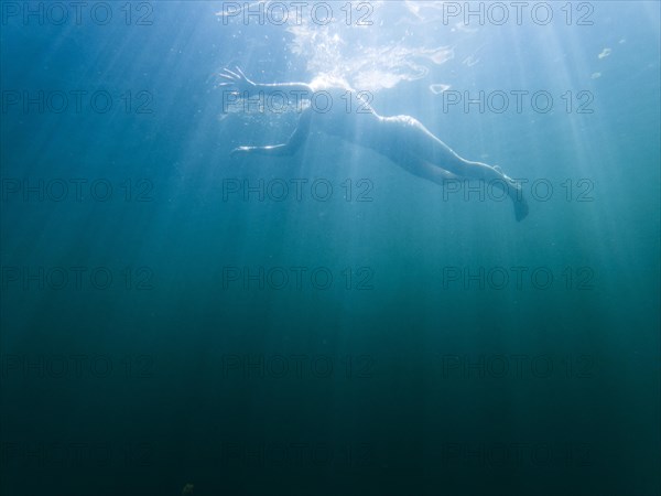 A floating woman stands out in a quarry in Koenigshain