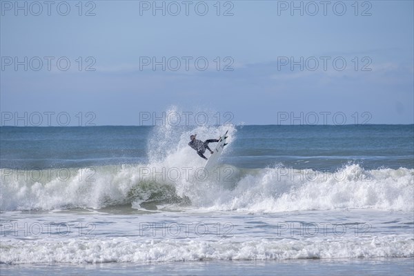 Surfers on the beach at Jeffreys Bay near Port Elizabeth